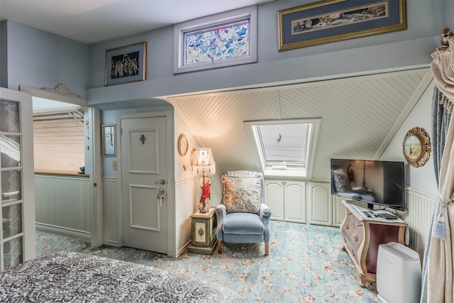 26 Point Breeze Dr, Rocky Point, NY 11778 - living area featuring carpet floors and a decorative wall