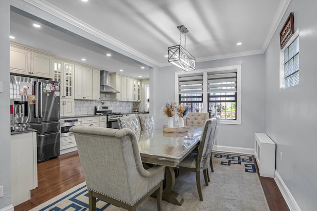14627 Reeves Ave, Flushing, NY 11367 - dining area featuring dark wood-style flooring, baseboards, crown molding, recessed lighting, and a chandelier