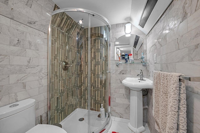14627 Reeves Ave, Flushing, NY 11367 - full bath featuring tile walls, a stall shower, toilet, and a sink