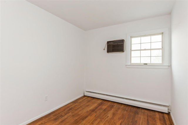 233 Violet St, Massapequa Park, NY 11762 - unfurnished room featuring a baseboard heating unit, baseboards, wood finished floors, and a wall mounted AC