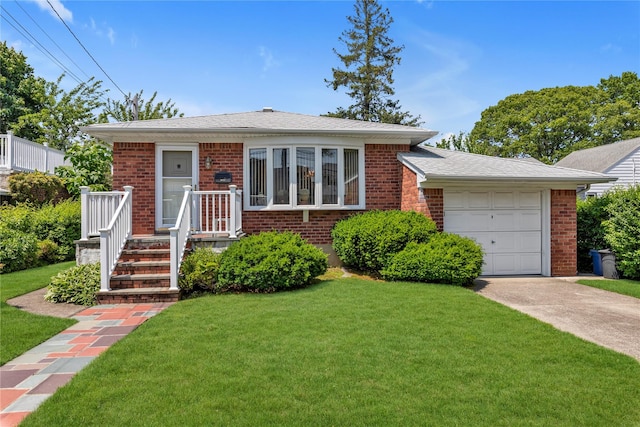 1649 Falmouth Ave, New Hyde Park, NY 11040 - view of front of home with brick siding, a front lawn, driveway, and a garage