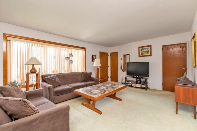 1649 Falmouth Ave, New Hyde Park, NY 11040 - living area featuring carpet floors