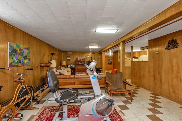 1649 Falmouth Ave, New Hyde Park, NY 11040 - workout area featuring wood walls and tile patterned floors