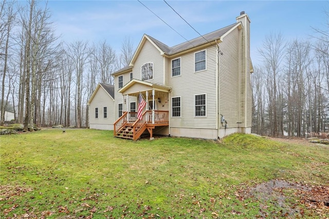 68 Cauthers Ln, Woodridge, NY 12789 - rear view of house with a chimney and a yard