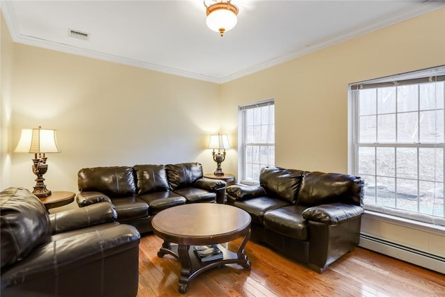 68 Cauthers Ln, Woodridge, NY 12789 - living area featuring baseboard heating, hardwood / wood-style flooring, and ornamental molding