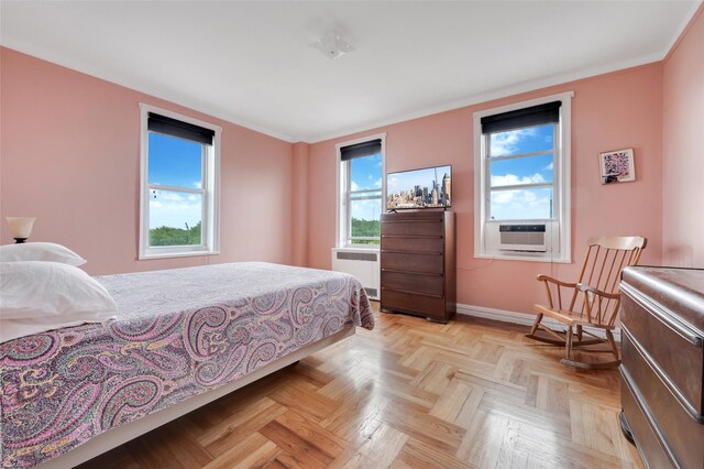 41-08 43rd St Unit 5J, Sunnyside, NY 11104 - bedroom with radiator, baseboards, and cooling unit