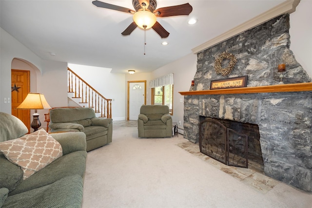 23 Saddle Rock Dr, Poughkeepsie, NY 12603 - carpeted living room with ceiling fan, stairs, a fireplace, recessed lighting, and arched walkways