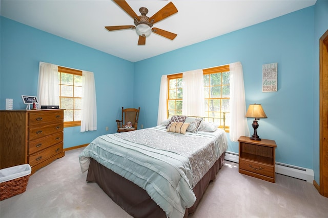 23 Saddle Rock Dr, Poughkeepsie, NY 12603 - bedroom with baseboard heating, light colored carpet, baseboards, and a ceiling fan
