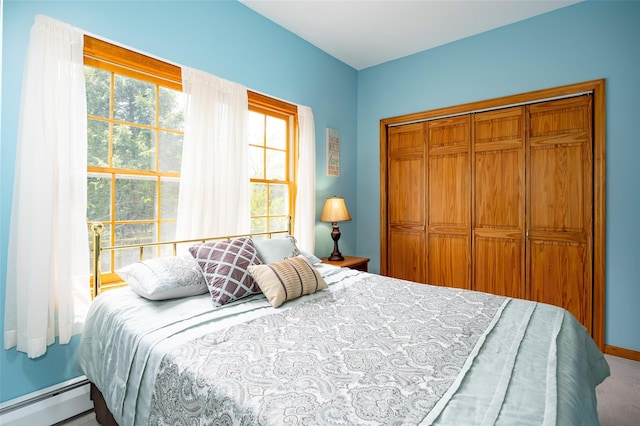 23 Saddle Rock Dr, Poughkeepsie, NY 12603 - bedroom with a baseboard radiator, carpet flooring, and a closet