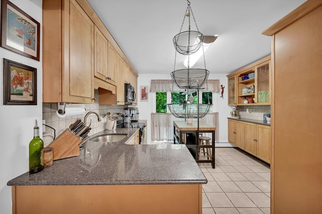 37 Scenic Cir, Croton-On-Hudson, NY 10520 - kitchen with black microwave, decorative backsplash, electric stove, a chandelier, and light tile patterned floors