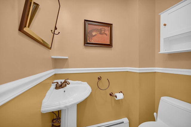 37 Scenic Cir, Croton-On-Hudson, NY 10520 - bathroom with toilet and a baseboard radiator
