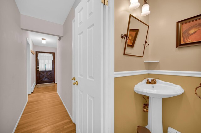 37 Scenic Cir, Croton-On-Hudson, NY 10520 - half bath featuring wood finished floors and baseboard heating