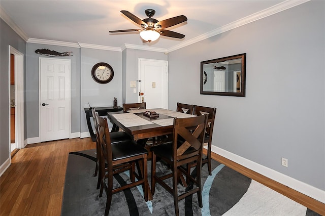 200 N Village Ave Unit D5, Rockville Centre, NY 11570 - dining area with wood finished floors, ornamental molding, baseboards, and a ceiling fan