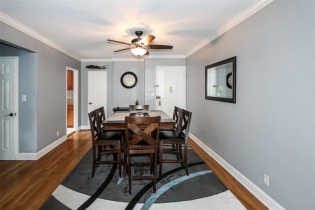 200 N Village Ave Unit D5, Rockville Centre, NY 11570 - dining area featuring dark wood finished floors, crown molding, baseboards, and ceiling fan