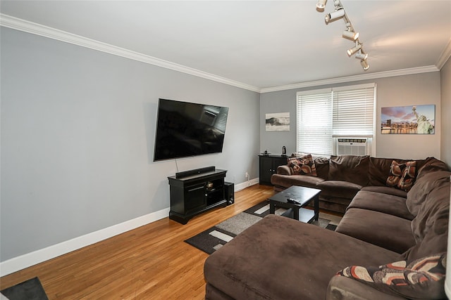 200 N Village Ave Unit D5, Rockville Centre, NY 11570 - living room featuring ornamental molding, baseboards, light wood finished floors, cooling unit, and rail lighting