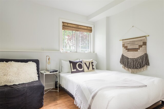 21 Hillside Dr W, Sag Harbor, NY 11963 - bedroom featuring wood finished floors