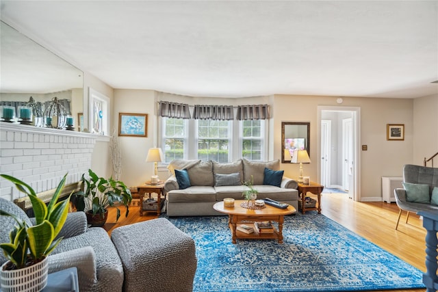 1515 Kenneth Ave, Baldwin, NY 11510 - living room featuring wood finished floors and baseboards
