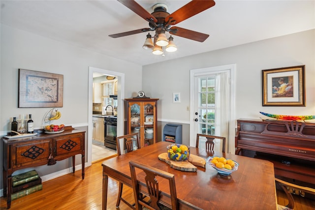 1515 Kenneth Ave, Baldwin, NY 11510 - dining area with ceiling fan and light wood finished floors