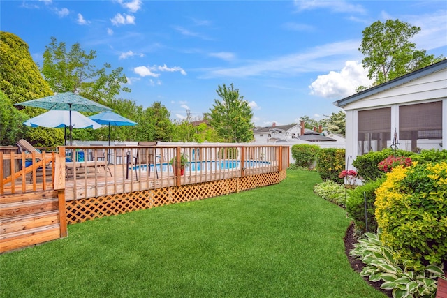 1515 Kenneth Ave, Baldwin, NY 11510 - view of green lawn featuring a deck