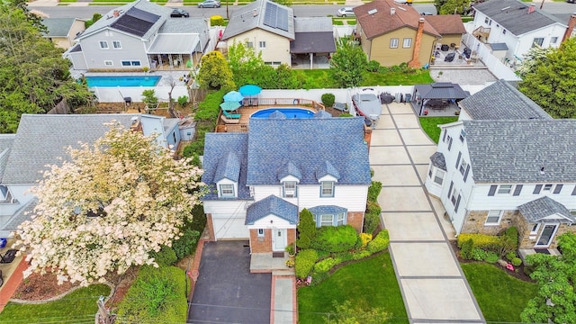 1515 Kenneth Ave, Baldwin, NY 11510 - aerial perspective of suburban area with a pool area