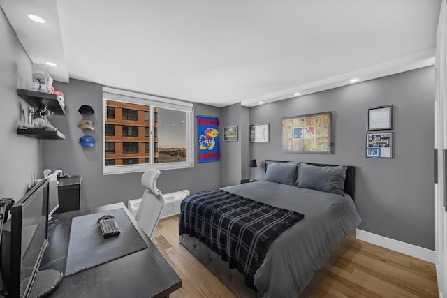 345 E 93rd St Unit 25Ak, New York Manhattan, NY 10128 - bedroom featuring recessed lighting, wood finished floors, baseboards, and an office area