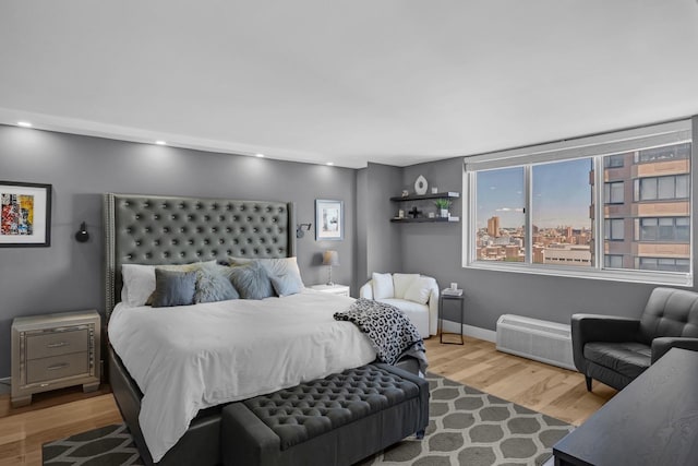 345 E 93rd St Unit 25Ak, New York Manhattan, NY 10128 - bedroom featuring wood finished floors and baseboards