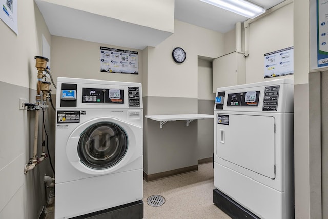 345 E 93rd St Unit 25Ak, New York Manhattan, NY 10128 - communal laundry room with separate washer and dryer and baseboards