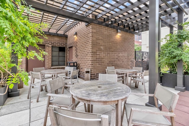 345 E 93rd St Unit 25Ak, New York Manhattan, NY 10128 - view of patio / terrace with outdoor dining space and a pergola