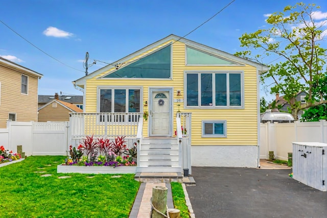 29 Mckinley Ave, Lindenhurst, NY 11757 - view of front facade featuring a patio area