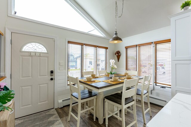 29 Mckinley Ave, Lindenhurst, NY 11757 - dining area featuring dark wood-style floors and lofted ceiling