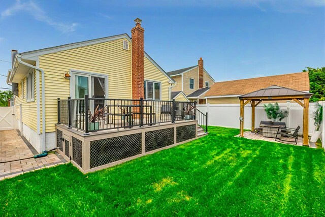 29 Mckinley Ave, Lindenhurst, NY 11757 - back of property with a gazebo, a patio area, and a wooden deck