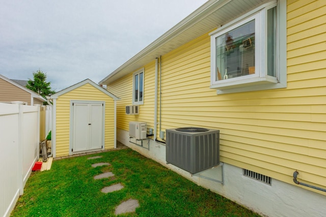 29 Mckinley Ave, Lindenhurst, NY 11757 - view of side of home featuring central AC unit and crawl space