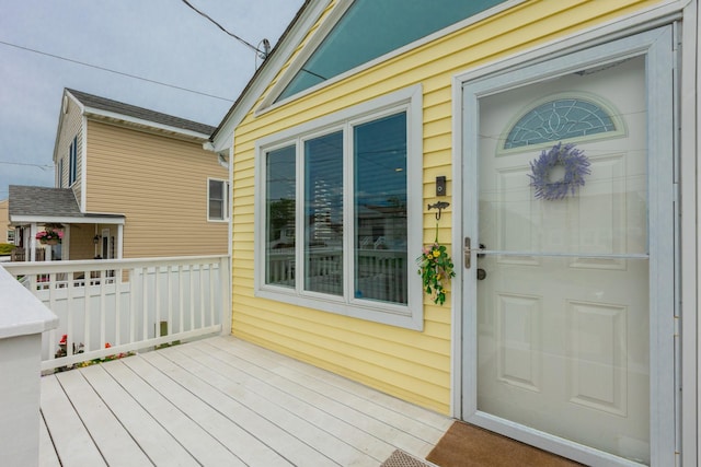 29 Mckinley Ave, Lindenhurst, NY 11757 - doorway to property with a wooden deck