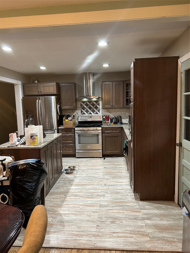 400 Old Rte 304, New City, NY 10956 - kitchen featuring appliances with stainless steel finishes, wall chimney range hood, light stone counters, recessed lighting, and tasteful backsplash