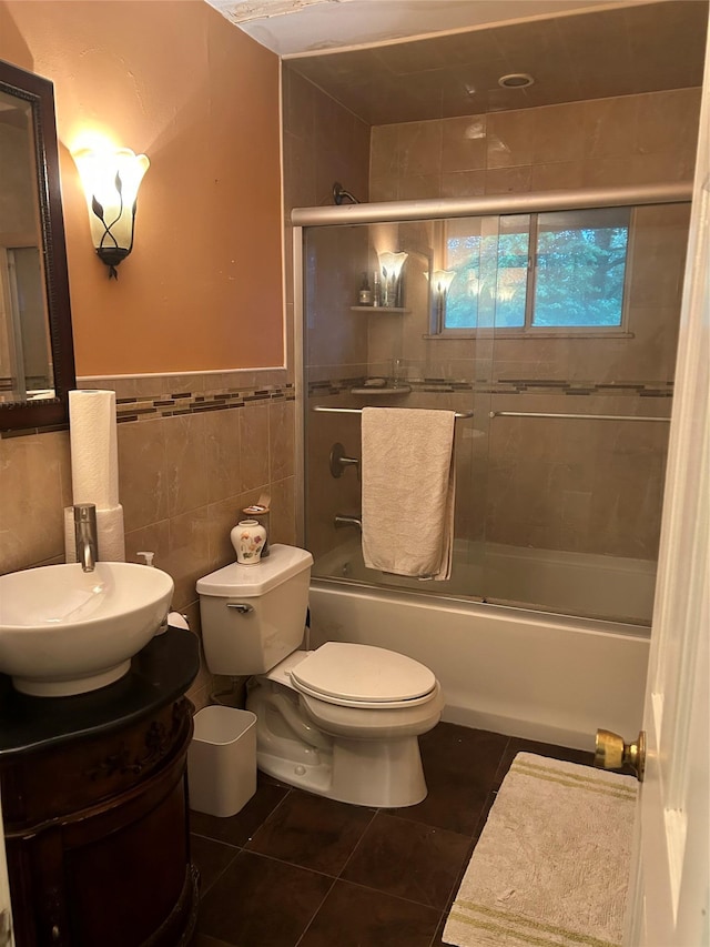 400 Old Rte 304, New City, NY 10956 - full bath with tile patterned flooring, toilet, combined bath / shower with glass door, tile walls, and vanity