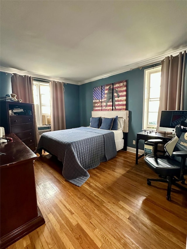 315 King St Unit 6H, Port Chester, NY 10573 - bedroom featuring a desk, crown molding, and hardwood / wood-style floors