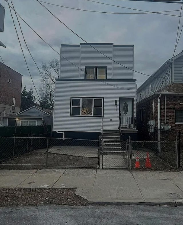 3215 Fairmount Ave, Bronx, NY 10465 - view of front of home with a fenced front yard