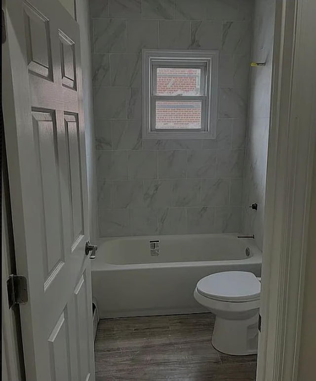 3215 Fairmount Ave, Bronx, NY 10465 - full bath with toilet, washtub / shower combination, and wood finished floors