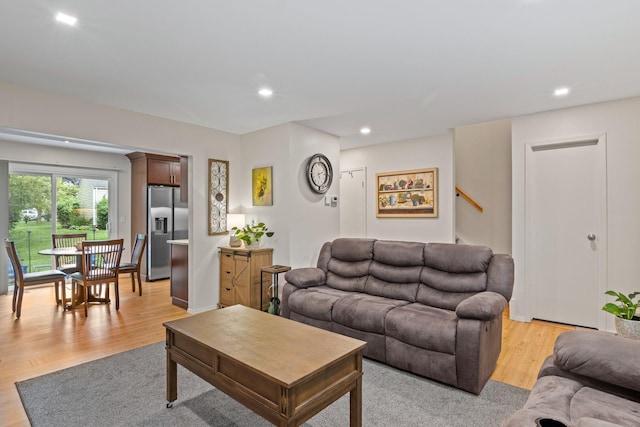 12 Franklin Commons, Yaphank, NY 11980 - living area featuring light wood finished floors and recessed lighting