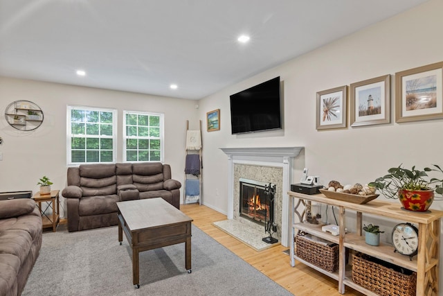 12 Franklin Commons, Yaphank, NY 11980 - living area with a premium fireplace, wood finished floors, and recessed lighting