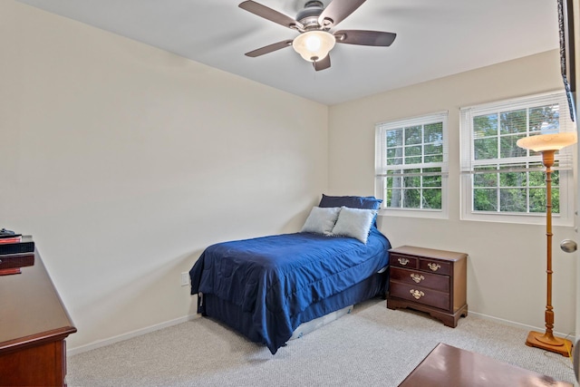 12 Franklin Commons, Yaphank, NY 11980 - bedroom featuring baseboards, light colored carpet, and ceiling fan
