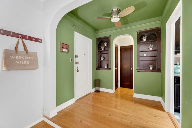 50 Lefferts Ave Unit 6M, Brooklyn, NY 11225 - hallway with arched walkways, wood-type flooring, baseboards, and ornamental molding