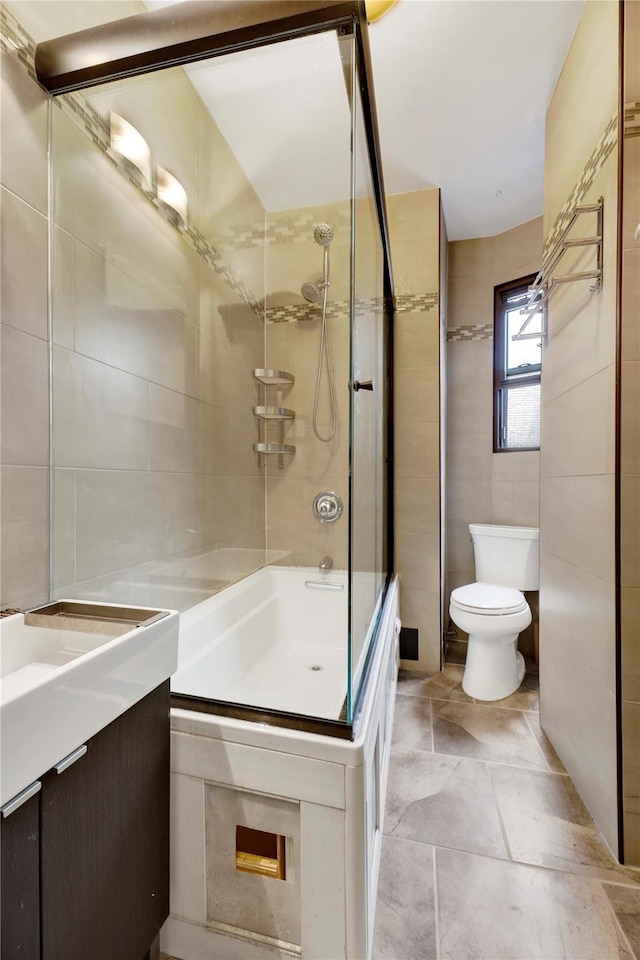 50 Lefferts Ave Unit 6M, Brooklyn, NY 11225 - bathroom with vanity, toilet, tile walls, and shower / bathtub combination