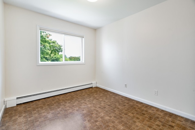 10 Fishkill Glen Dr Unit G, Fishkill, NY 12524 - unfurnished room featuring a baseboard heating unit and baseboards