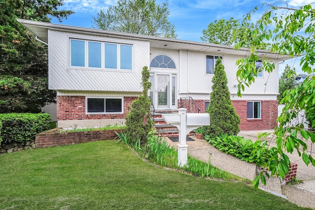 4 Mason Ct, Levittown, NY 11756 - raised ranch with brick siding and a front yard