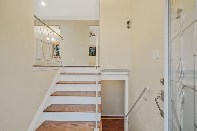 4 Mason Ct, Levittown, NY 11756 - stairway with wood finished floors and ornamental molding