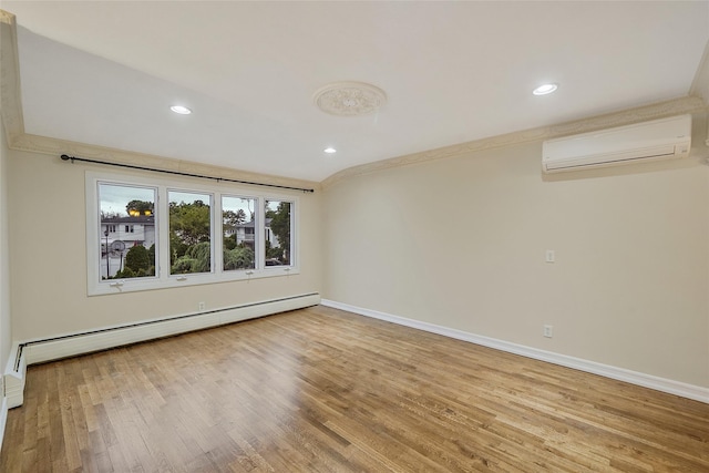 4 Mason Ct, Levittown, NY 11756 - spare room featuring an AC wall unit, baseboard heating, baseboards, wood finished floors, and recessed lighting