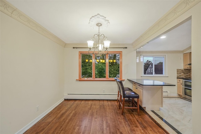 4 Mason Ct, Levittown, NY 11756 - dining area with a baseboard heating unit, a chandelier, crown molding, baseboards, and light wood-style flooring