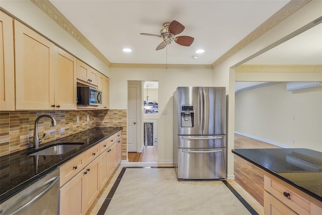 4 Mason Ct, Levittown, NY 11756 - kitchen featuring appliances with stainless steel finishes, a sink, a wall mounted AC, light brown cabinetry, and a ceiling fan
