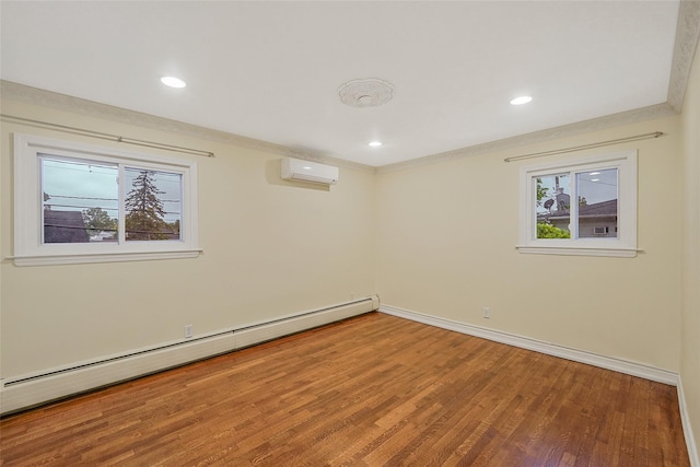 4 Mason Ct, Levittown, NY 11756 - basement featuring baseboard heating, healthy amount of natural light, a wall mounted air conditioner, wood finished floors, and recessed lighting